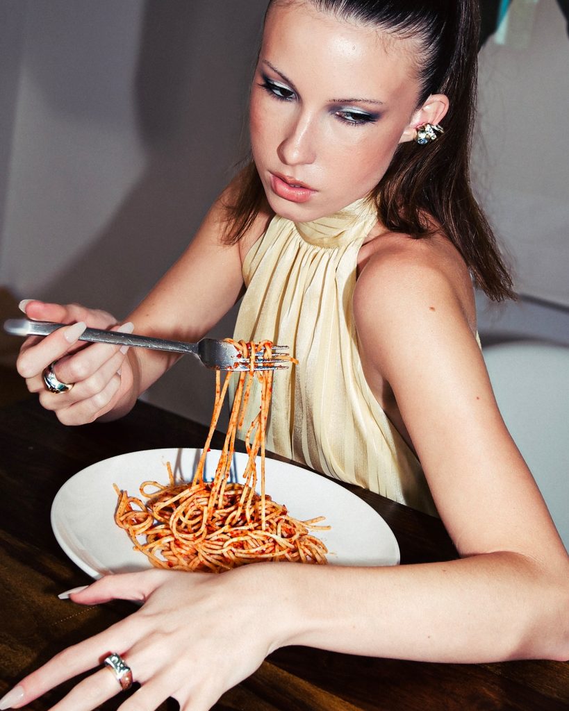 Tess Donatello wearing Dea Rail jewelry in an editorial self-portrait